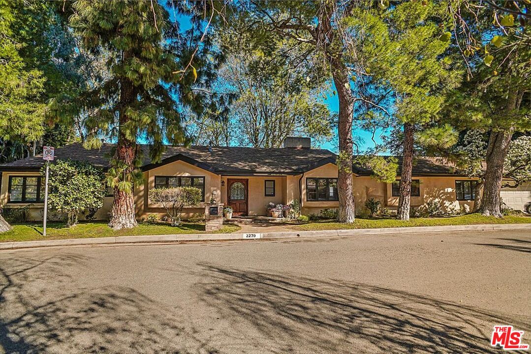 2270 Stradella Road Los Angeles, CA 90077 - Photo 3 of 29 a front view of a building with street view