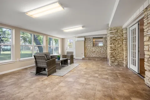 a view of livingroom with furniture and windows