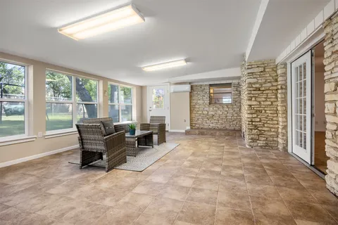 a view of livingroom with furniture and windows
