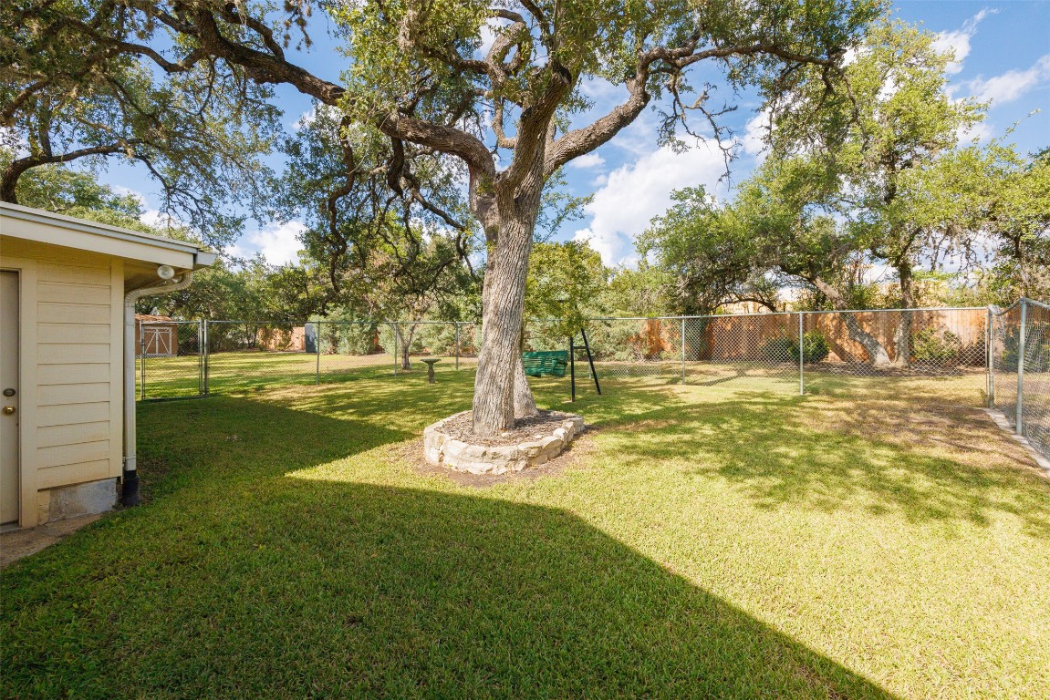 9504 Flintrock Circle Austin, TX 78737 - Photo 30 of 31 a view of a park with large trees