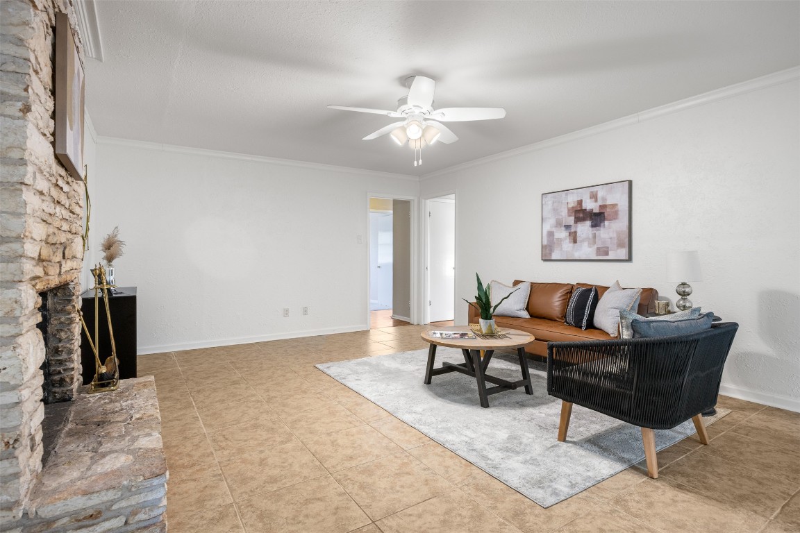 9504 Flintrock Circle Austin, TX 78737 - Photo 7 of 31 a living room with furniture and a chandelier