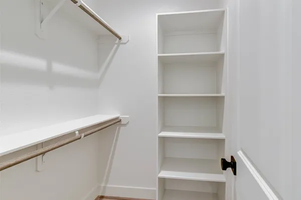 a hallway with closet