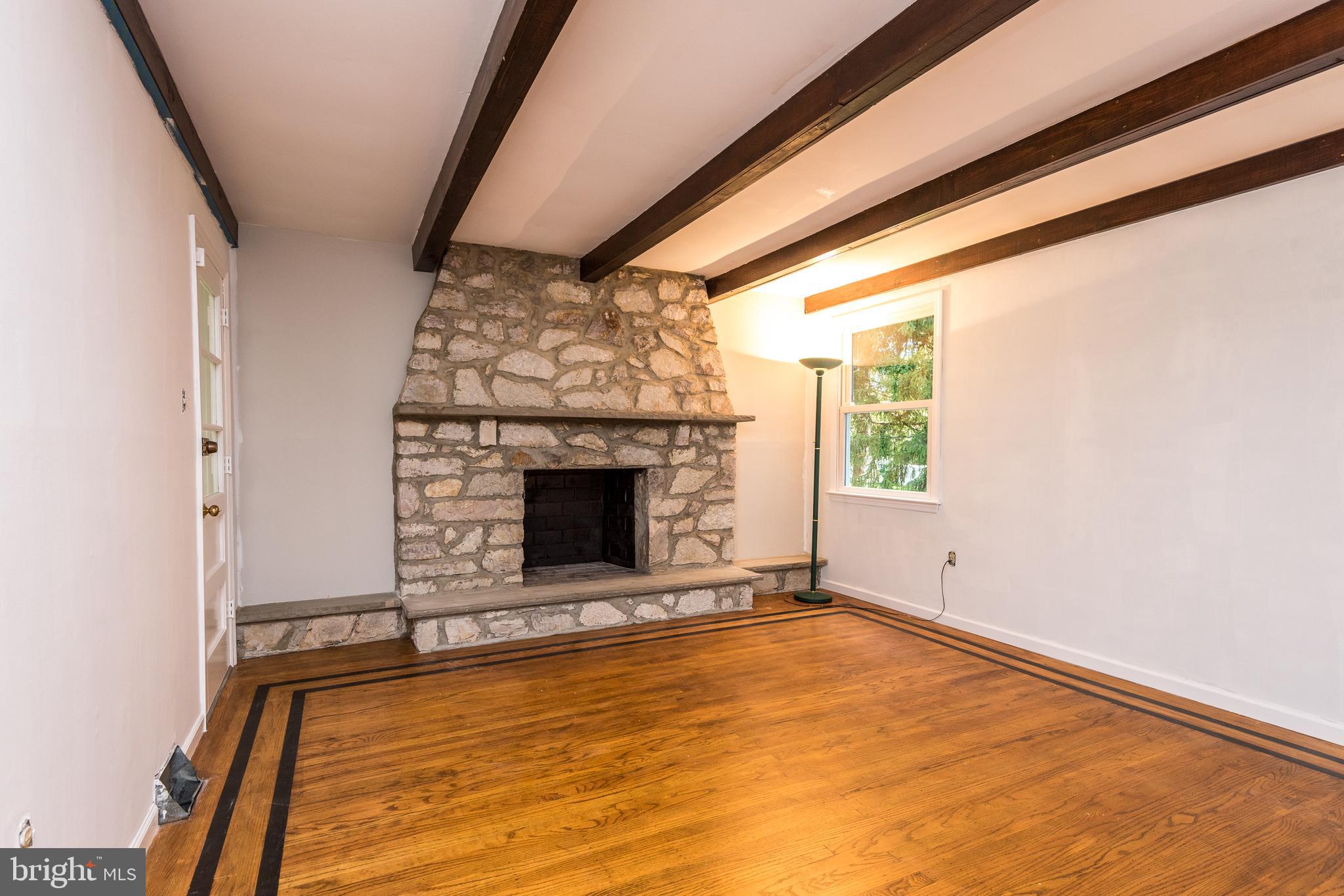 35 Kelinger Road Churchville, PA 18966 - Photo 14 of 31 Family Room With Stone Wood Burning Fireplace