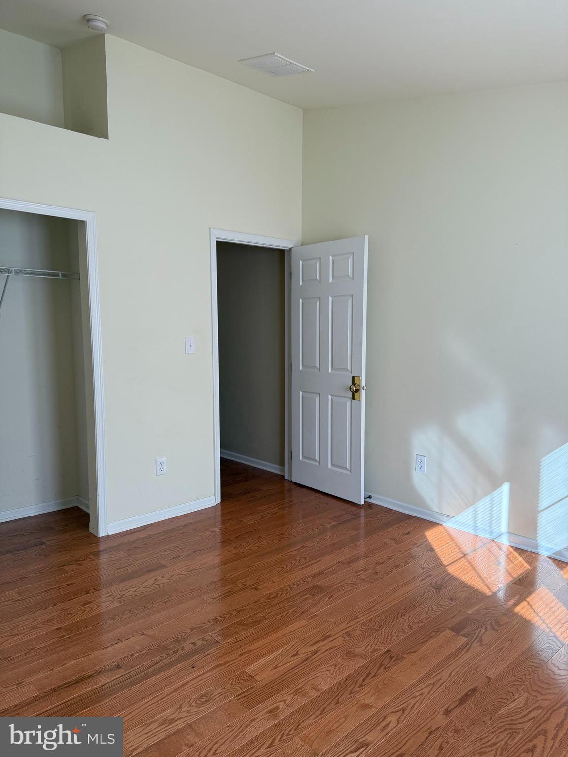 26 Tree Swallow Drive Princeton, NJ 08540 - Photo 18 of 25 a view of an empty room with wooden floor