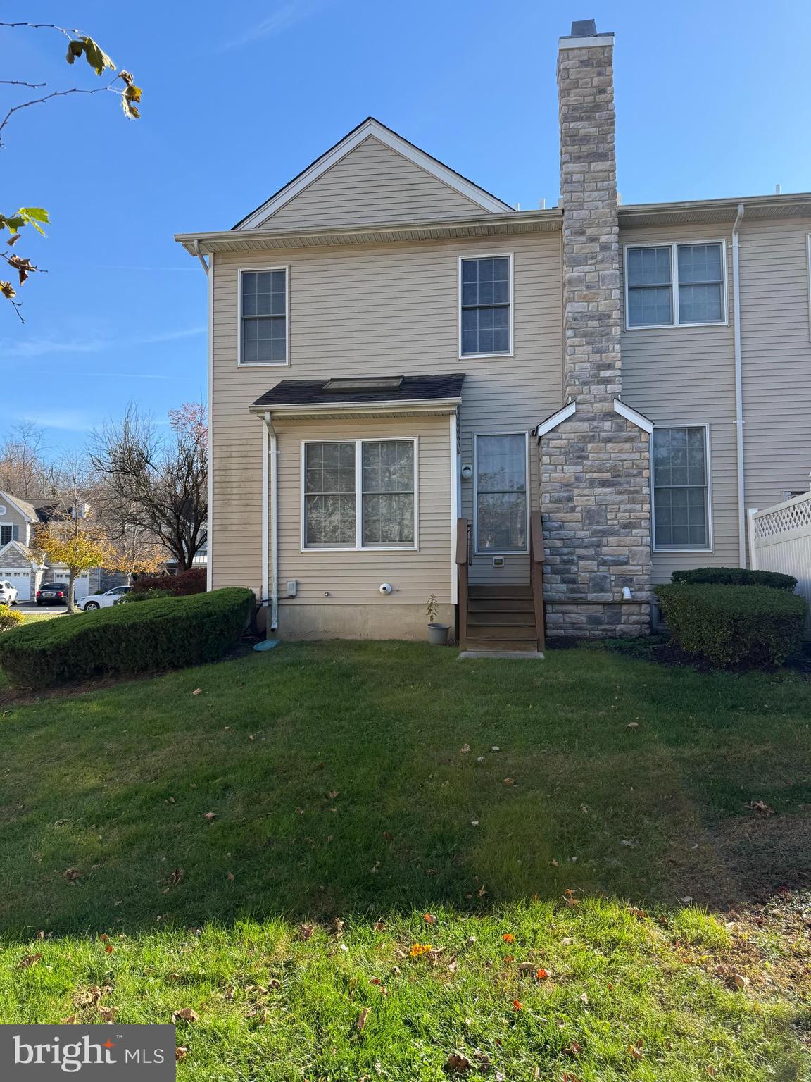 26 Tree Swallow Drive Princeton, NJ 08540 - Photo 22 of 25 a front view of a house with a garden