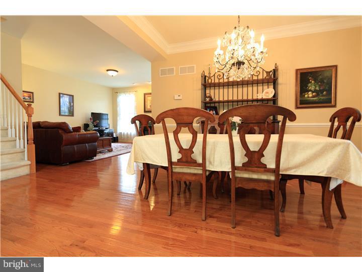 26 Tree Swallow Drive Princeton, NJ 08540 - Photo 4 of 25 a view of a dining room with furniture window and wooden floor