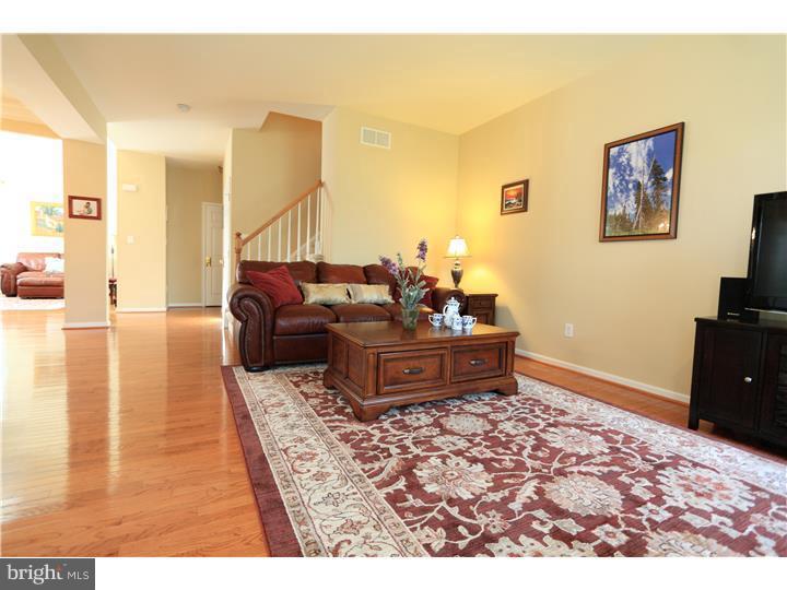 26 Tree Swallow Drive Princeton, NJ 08540 - Photo 5 of 25 a living room with furniture and a rug