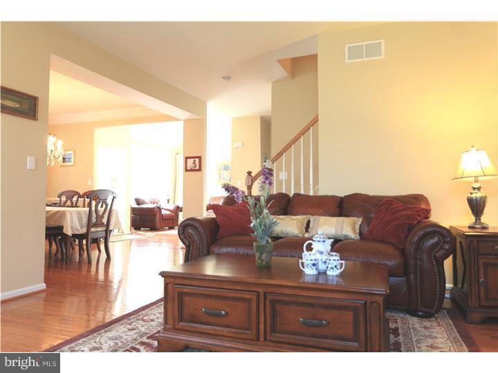 26 Tree Swallow Drive Princeton, NJ 08540 - Photo 6 of 25 a living room with furniture and wooden floor