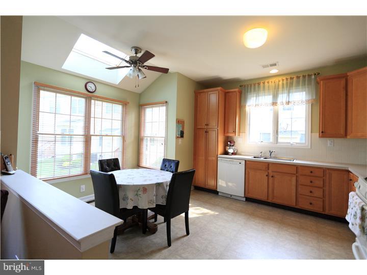 26 Tree Swallow Drive Princeton, NJ 08540 - Photo 7 of 25 a living room with granite countertop furniture and a kitchen view