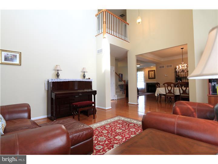 26 Tree Swallow Drive Princeton, NJ 08540 - Photo 10 of 25 a living room with furniture and a piano
