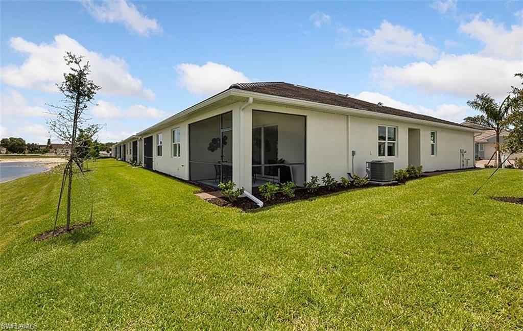 926 Enbrook Loop Naples, FL 34114 - Photo 15 of 15 a view of a house with backyard