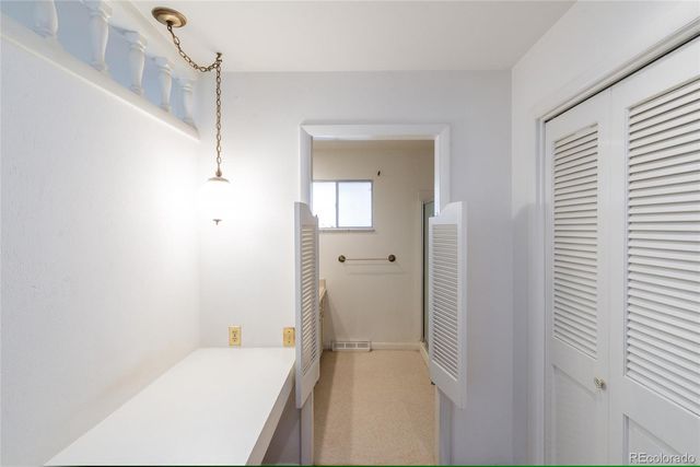 a bathroom with a tub and shower