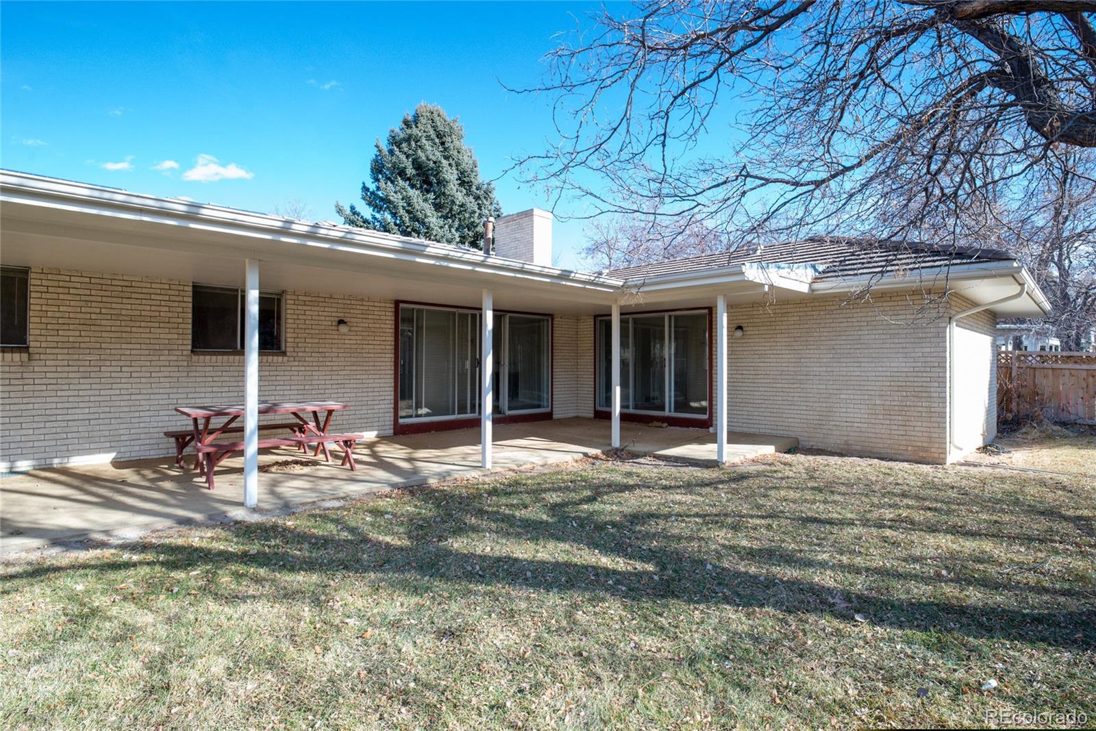 3605 South Oneida Way Denver, CO 80237 - Photo 18 of 24 a backyard of a house with seating space