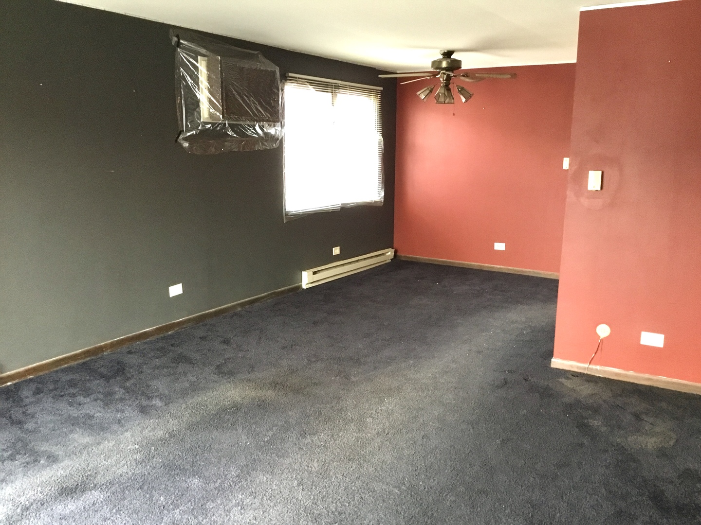6624 West 64th Place, Unit 3A Chicago, IL 60638 - Photo 4 of 15 an empty room with windows and fan