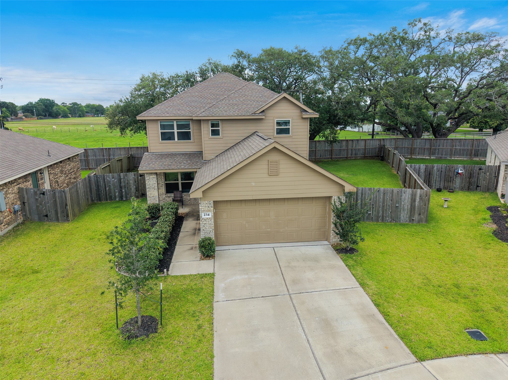 234 Bennett Street Angleton, TX 77515 - Photo 31 of 33 Large two-car driveway allowing for four cars to be parked.
