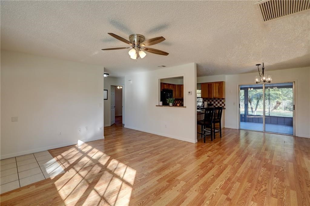 441 Columbus Street Sebastian, FL 32958 - Photo 16 of 35 a view of a livingroom with a furniture wooden floor and window