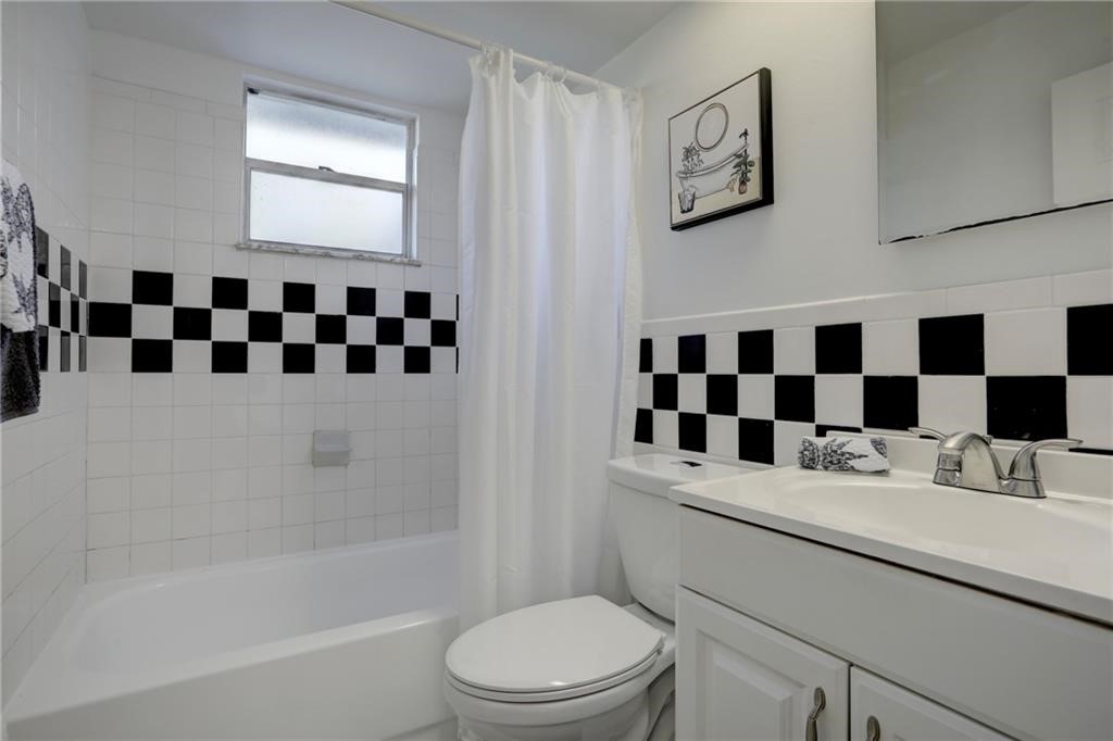 441 Columbus Street Sebastian, FL 32958 - Photo 20 of 35 a bathroom with a sink a toilet and shower
