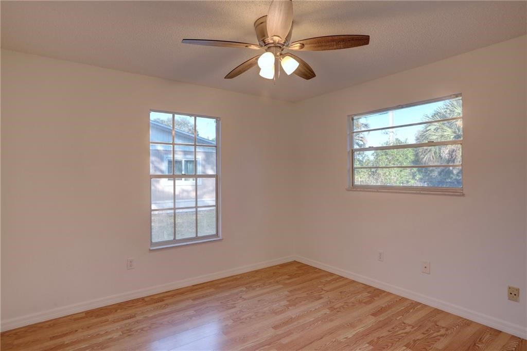441 Columbus Street Sebastian, FL 32958 - Photo 21 of 35 a view of an empty room with windows