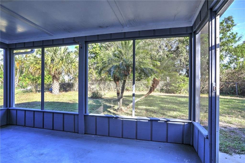441 Columbus Street Sebastian, FL 32958 - Photo 27 of 35 a view of a room with wooden floor and balcony