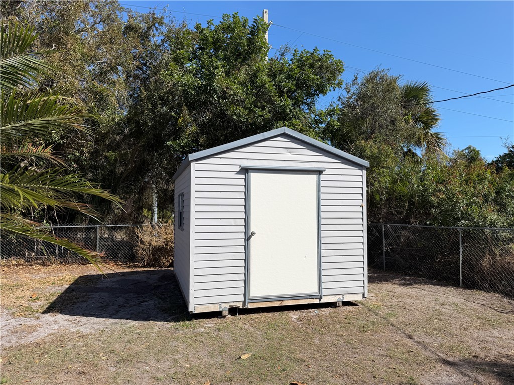 441 Columbus Street Sebastian, FL 32958 - Photo 30 of 35 a front view of a house with a yard