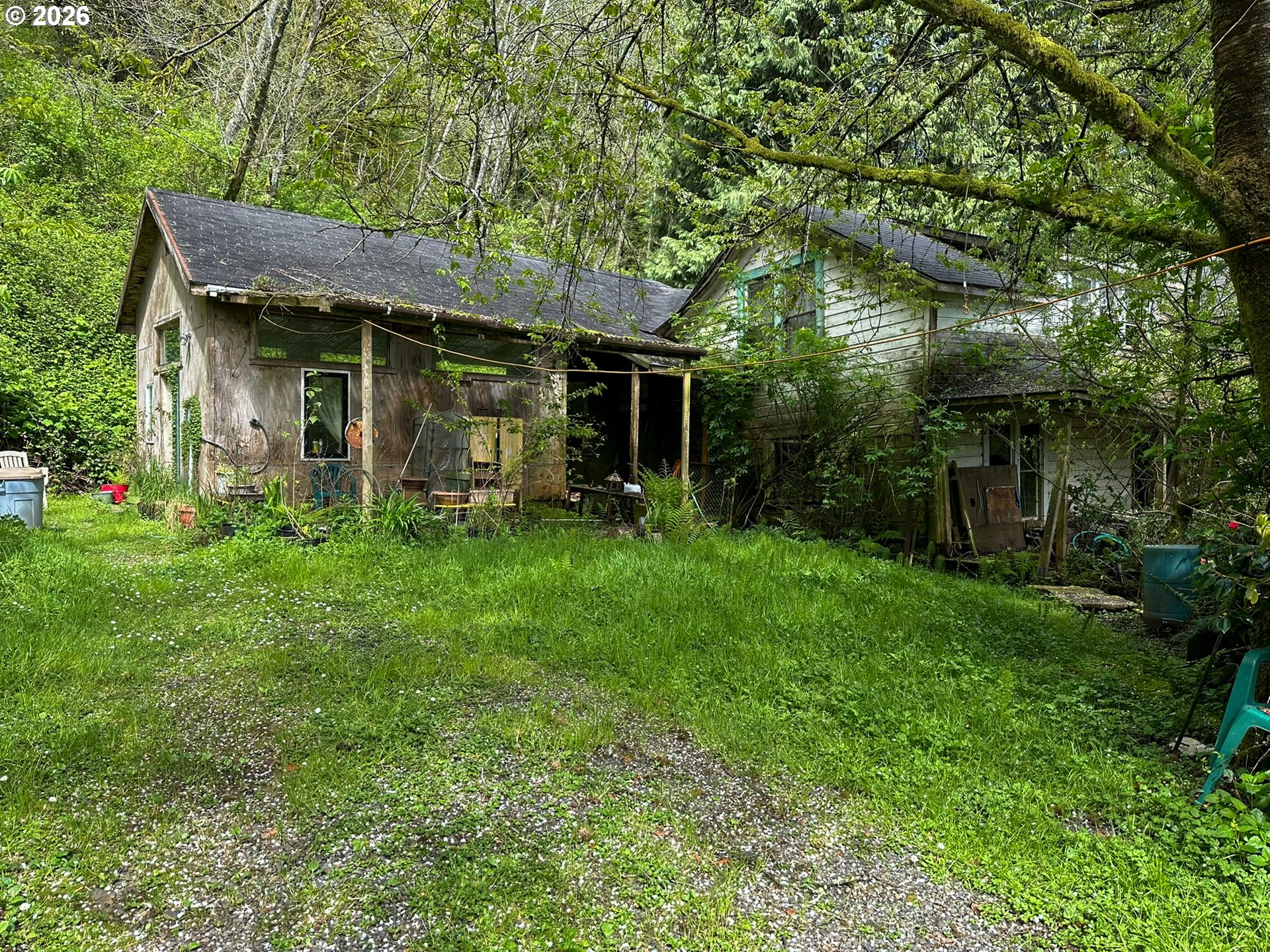 9150 Kilchis River Road Tillamook, OR 97141 - Photo 6 of 20 a view of a porch with a yard