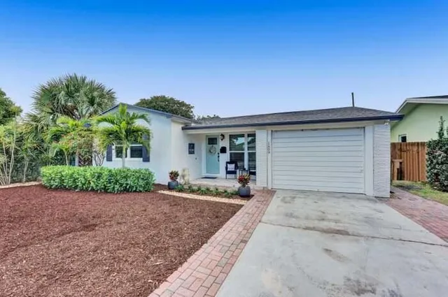 front view of a house with a patio