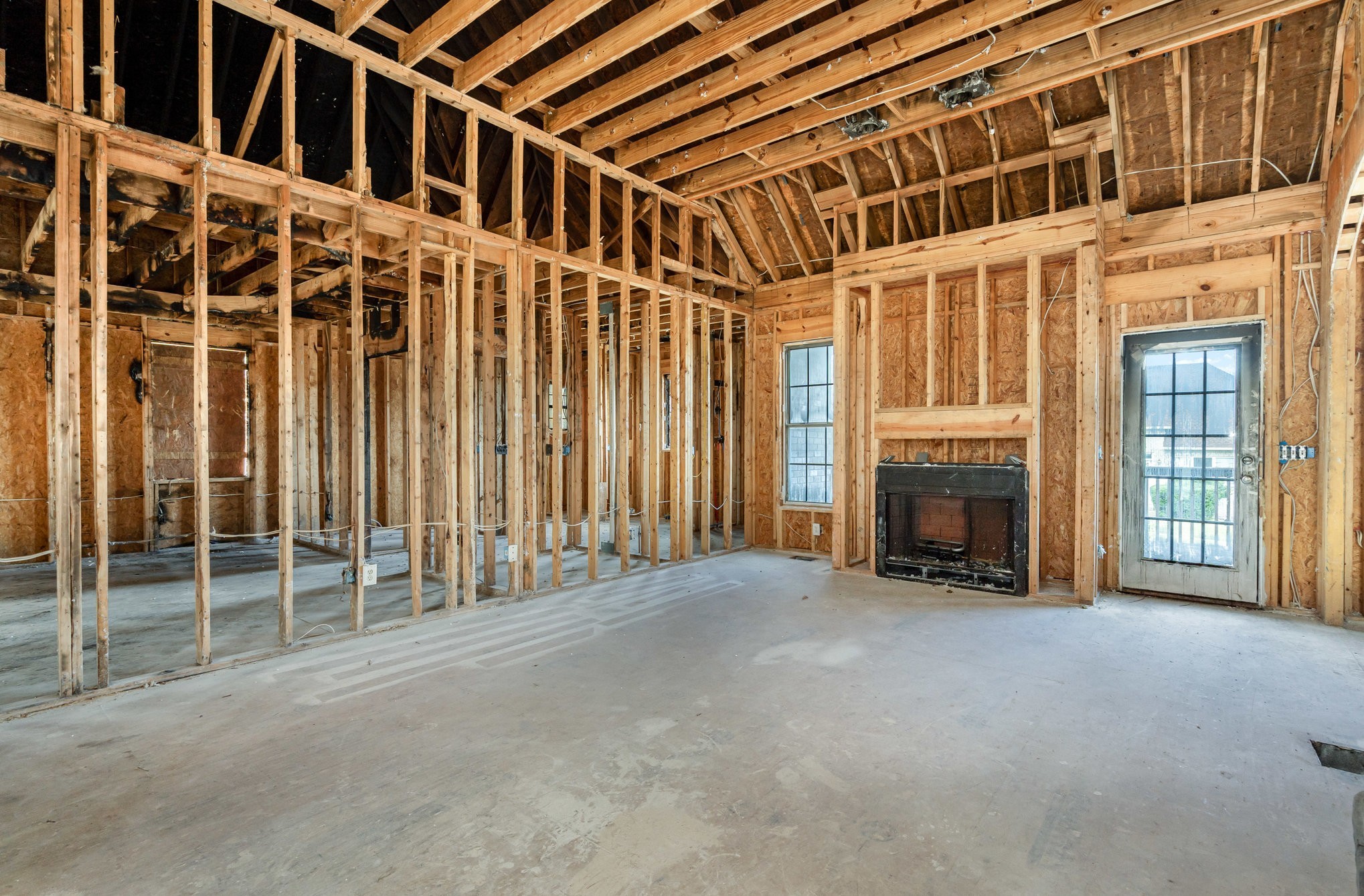 1774 Shagbark Way Gallatin, TN 37066 - Photo 5 of 24 a view of an empty room with a fireplace