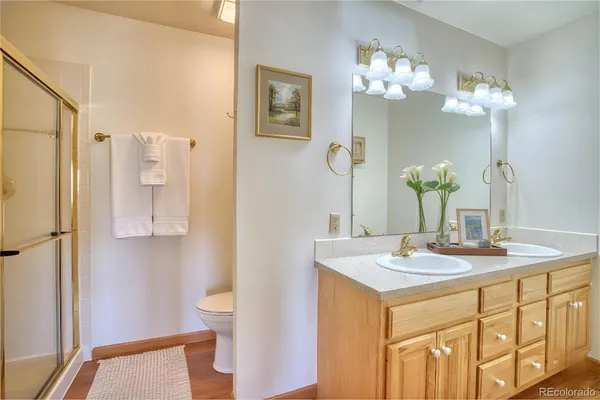 a bathroom with a sink vanity and a mirror