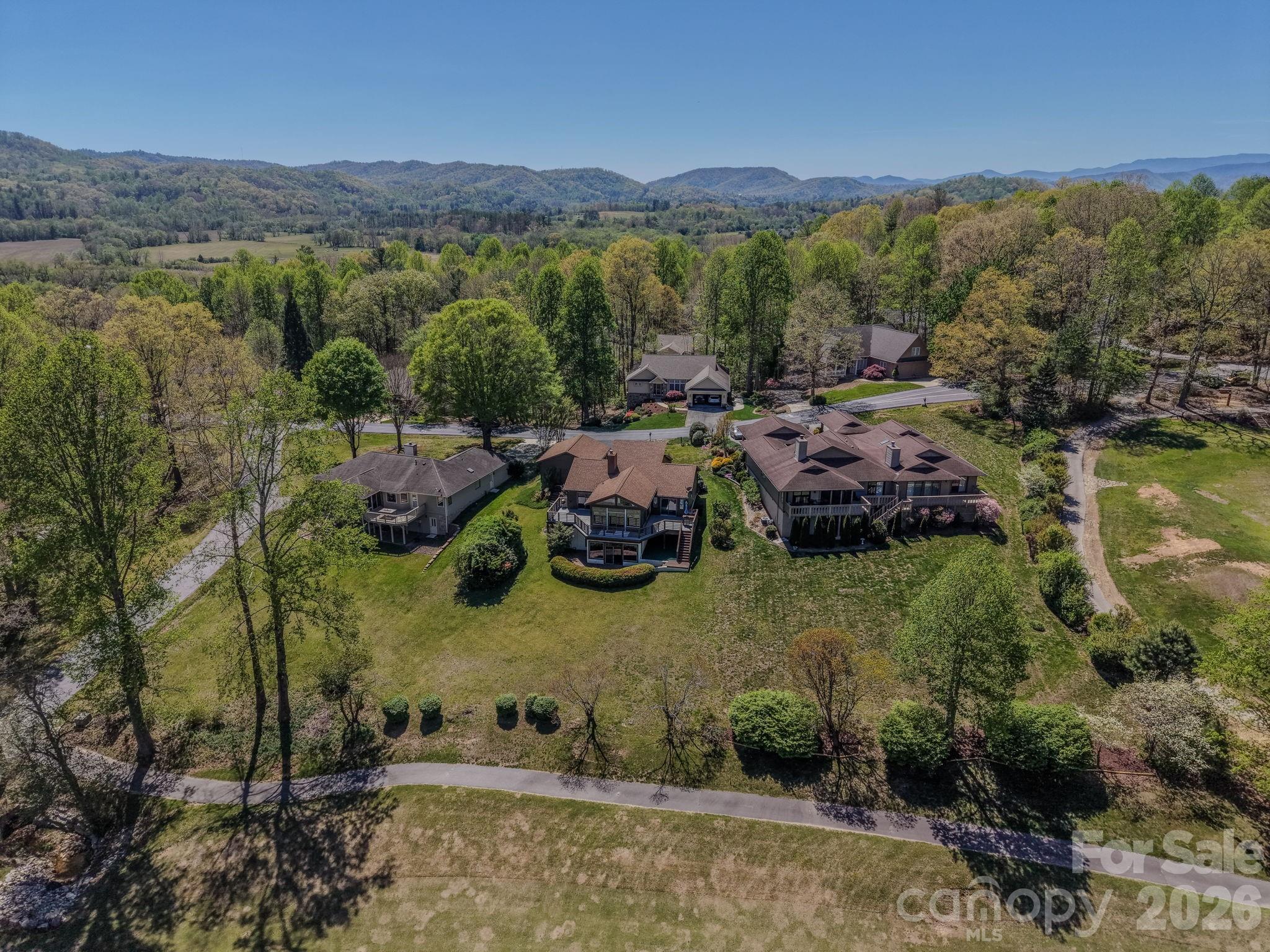 3104 Cove Loop Road Hendersonville, NC 28739 - Photo 36 of 40 an aerial view of multiple house