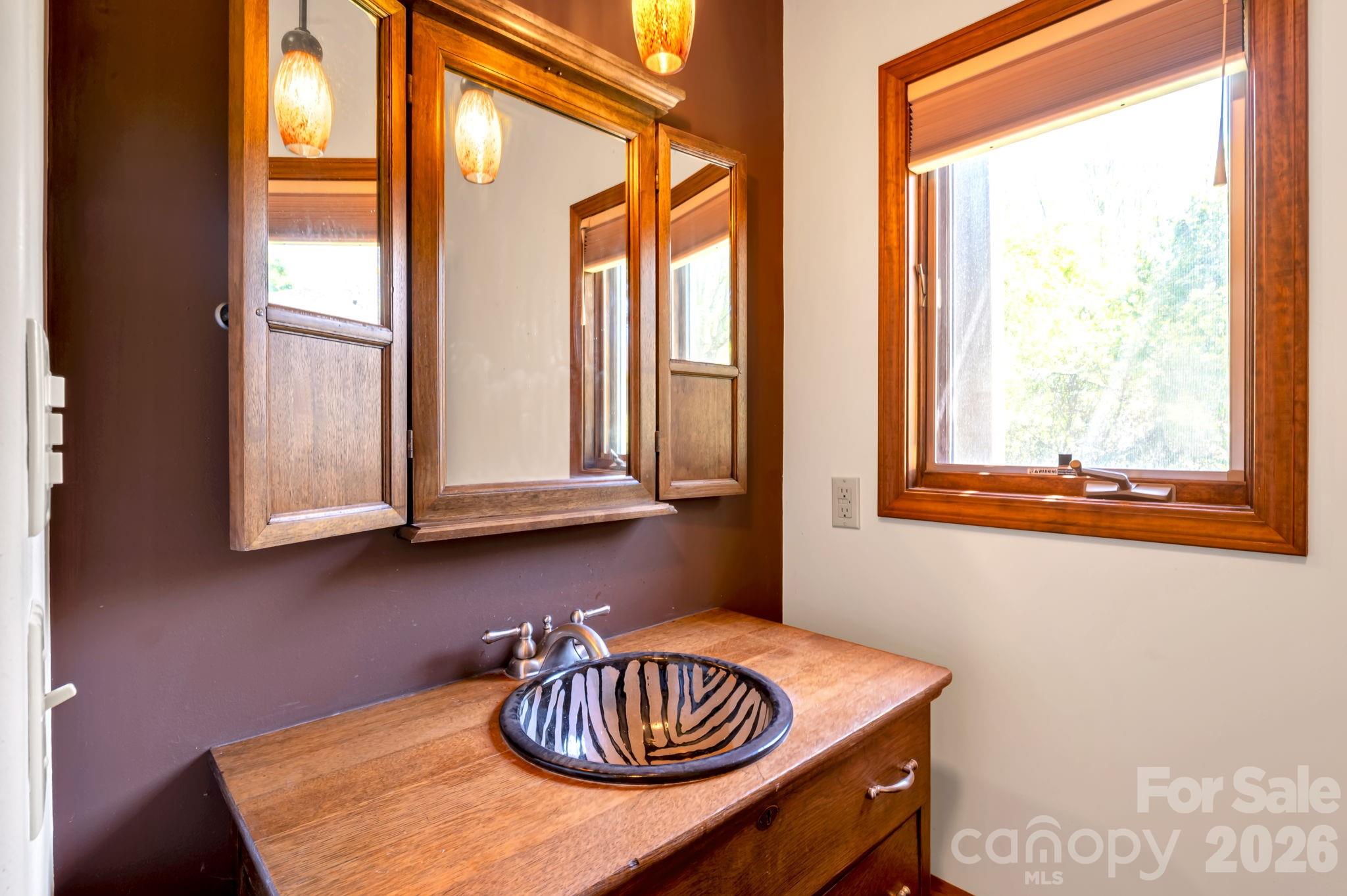 3104 Cove Loop Road Hendersonville, NC 28739 - Photo 37 of 40 a table with a window