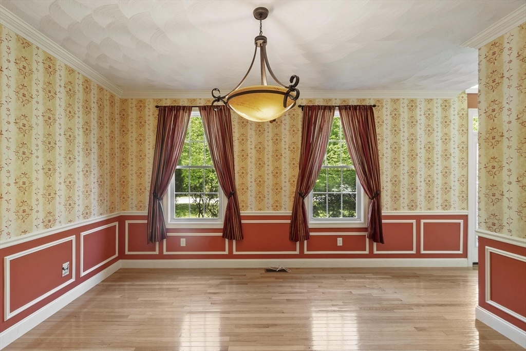 4 Forest Street Georgetown, MA 01833 - Photo 14 of 37 a view of a room with wooden floor and windows