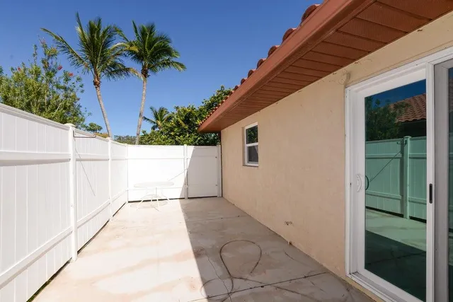 a house view with a potted plant
