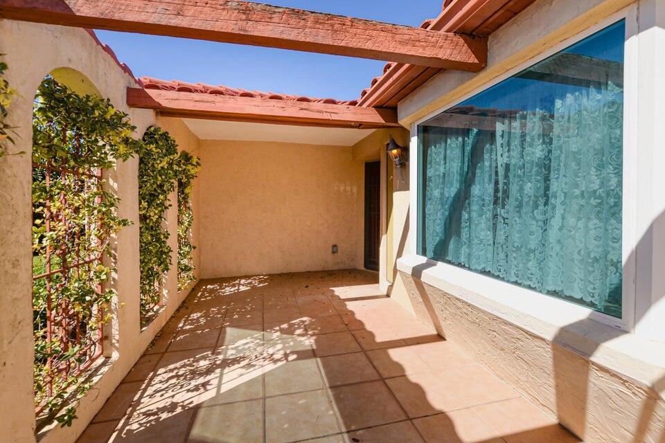 1117 Southeast Mendoza Avenue Port St. Lucie, FL 34952 - Photo 3 of 24 a view of a porch
