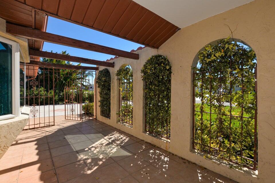 1117 Southeast Mendoza Avenue Port St. Lucie, FL 34952 - Photo 4 of 24 a view of a entryway door of the house