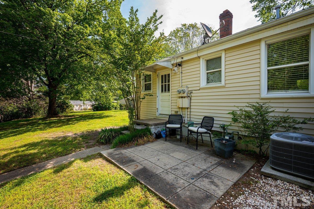2215 Bernard Street, Unit 2215 Raleigh, NC 27608 - Photo 15 of 16 a view of a house with swimming pool and sitting area