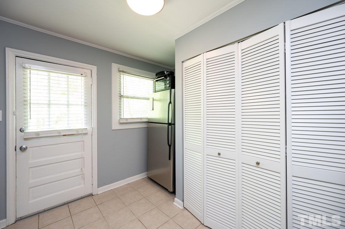 2215 Bernard Street, Unit 2215 Raleigh, NC 27608 - Photo 9 of 16 a view of a kitchen that has a window