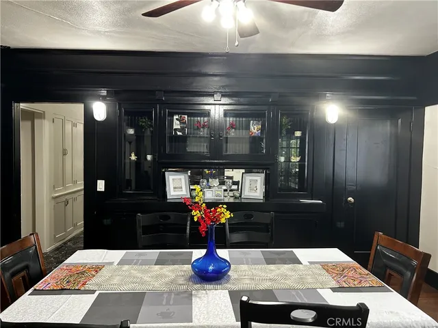 a room with table and chairs