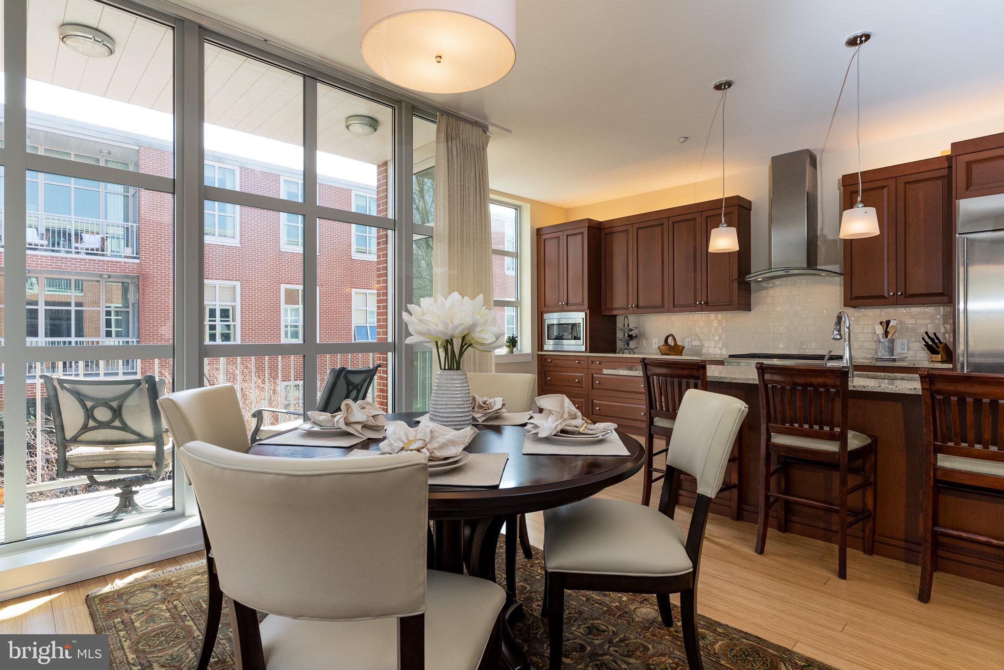 226 Iron Works Way Wayne, PA 19087 - Photo 11 of 30 Dining Area & Kitchen w/ floor-to-ceiling windows