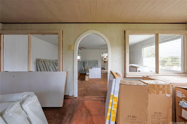 a view of livingroom with furniture and window