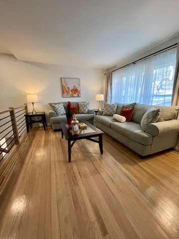 a kitchen with stainless steel appliances granite countertop a stove a refrigerator and a sink