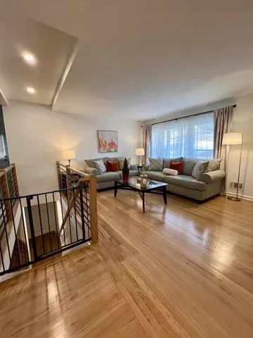 a view of a dining room with furniture and window