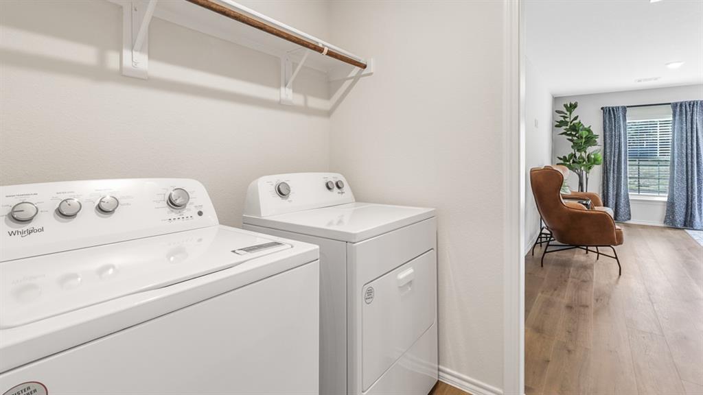1667 Mantle Road Crandall, TX 75114 - Photo 18 of 20 Dedicated laundry area featuring a white top-load washing machine and white electric dryer