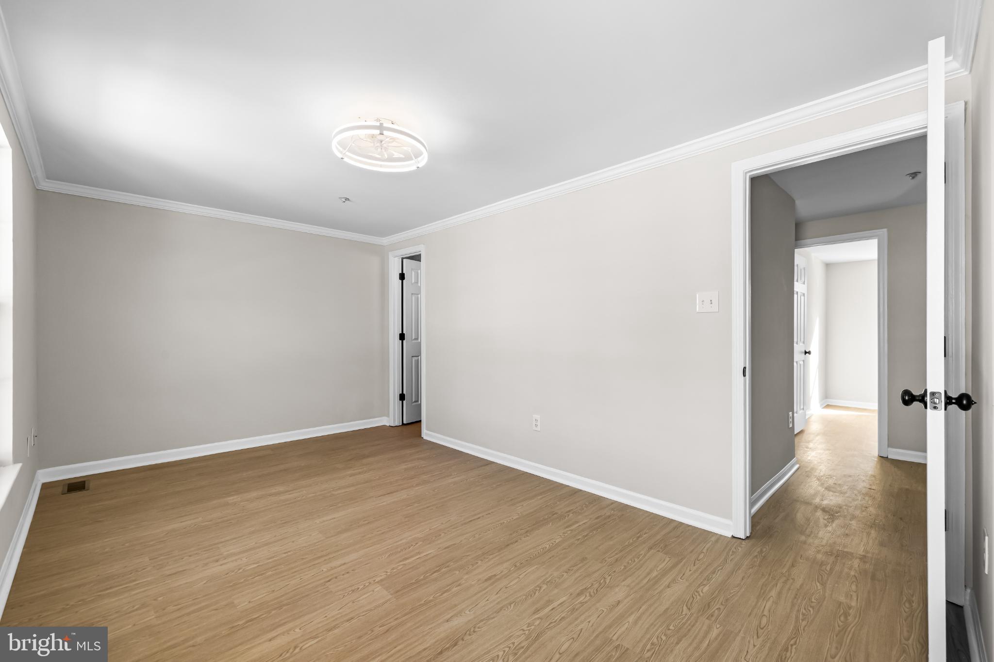 925 Pirates Court Edgewood, MD 21040 - Photo 12 of 29 a view of an empty room with wooden floor
