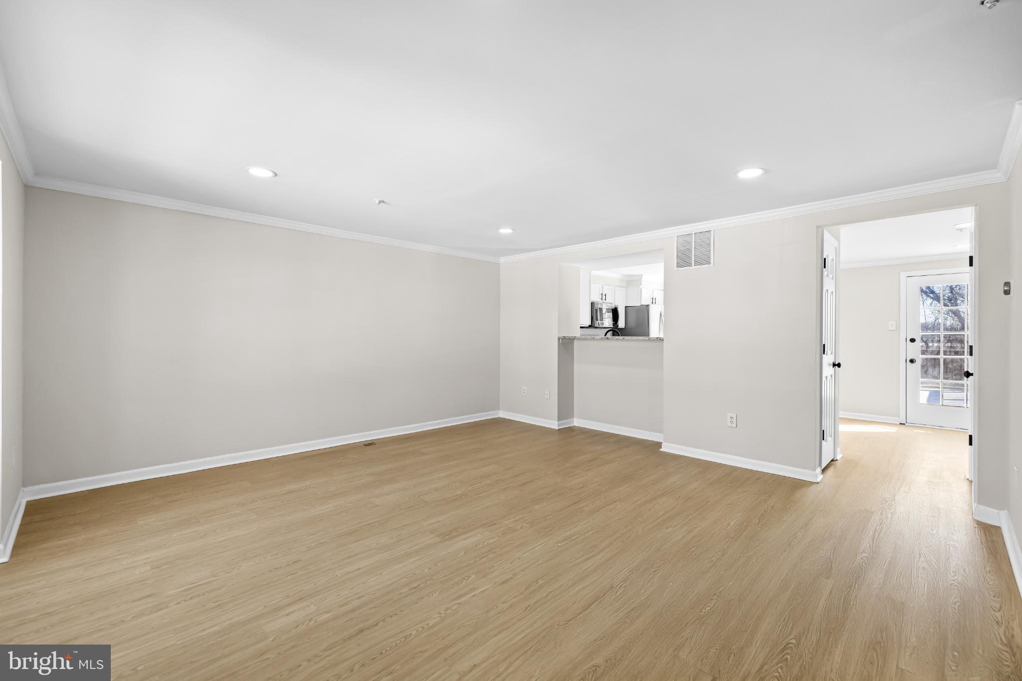925 Pirates Court Edgewood, MD 21040 - Photo 4 of 29 a view of empty room with wooden floor