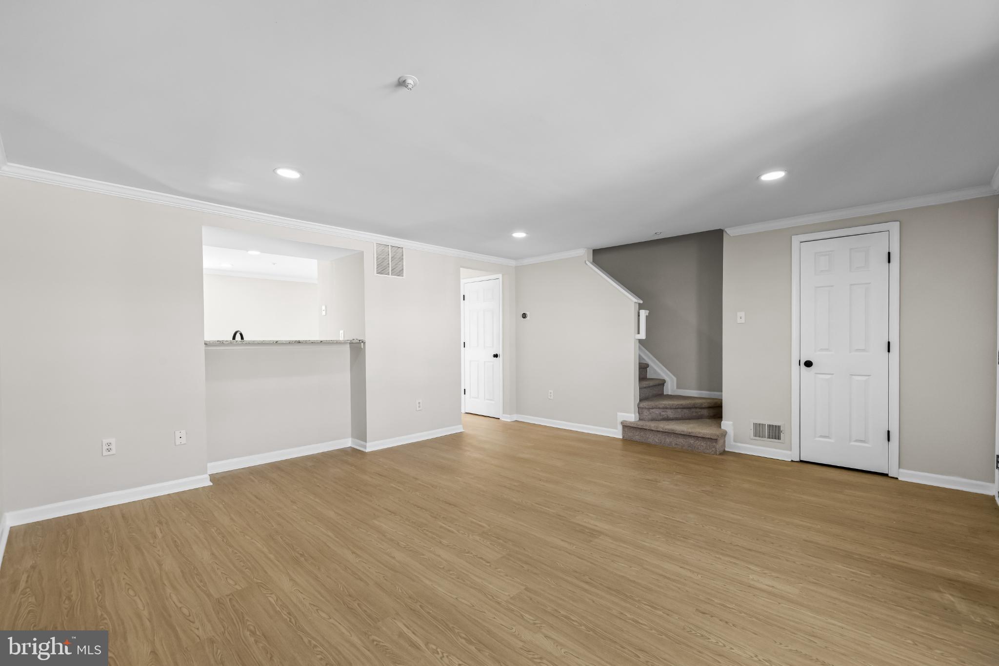925 Pirates Court Edgewood, MD 21040 - Photo 6 of 29 a view of an empty room with wooden floor