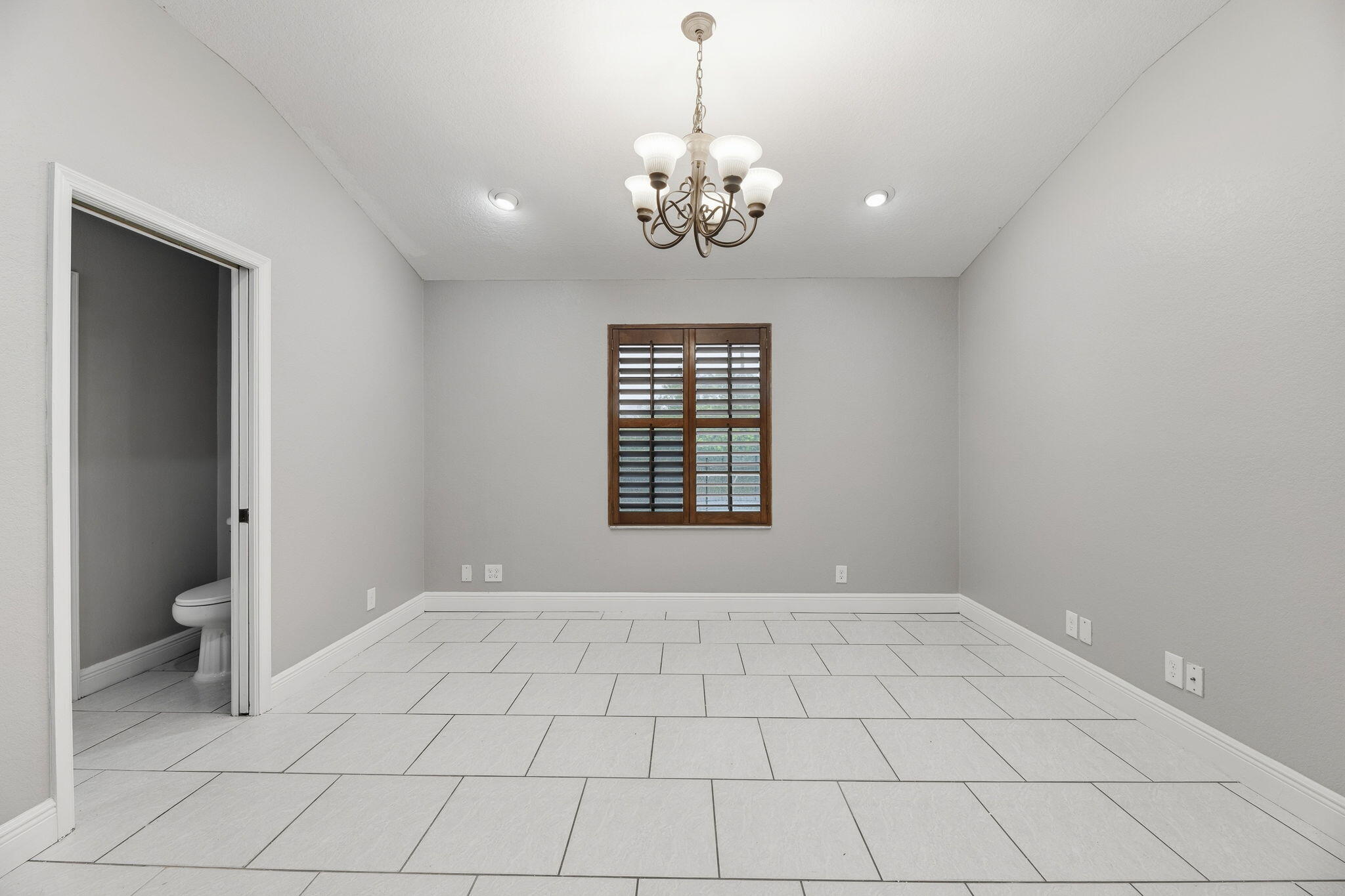 15731 85th Road North Loxahatchee, FL 33470 - Photo 23 of 65 a view of an empty room with a window