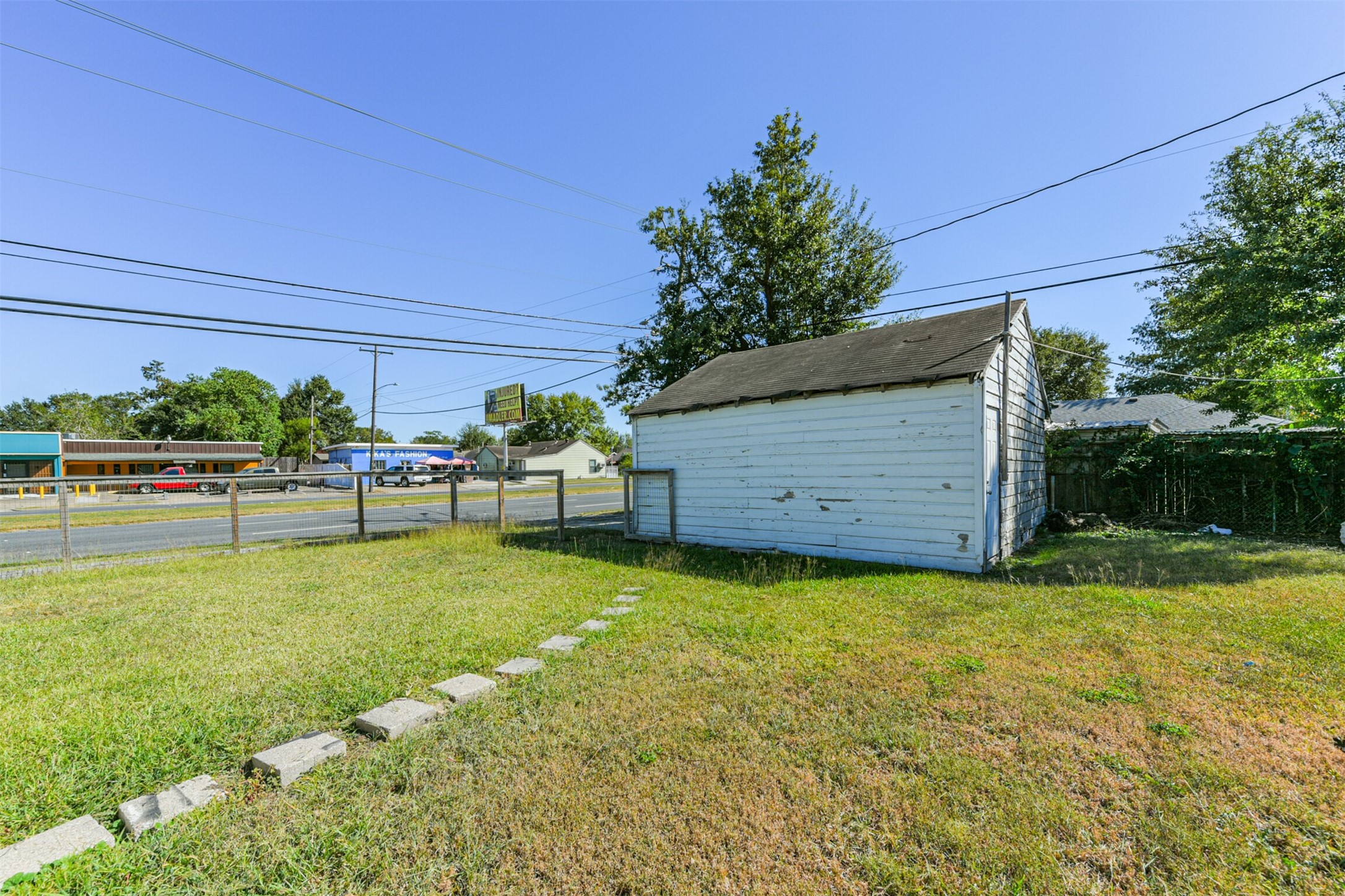 7546 Greendowns Street Houston, TX 77087 - Photo 32 of 33 a view of a backyard with garden