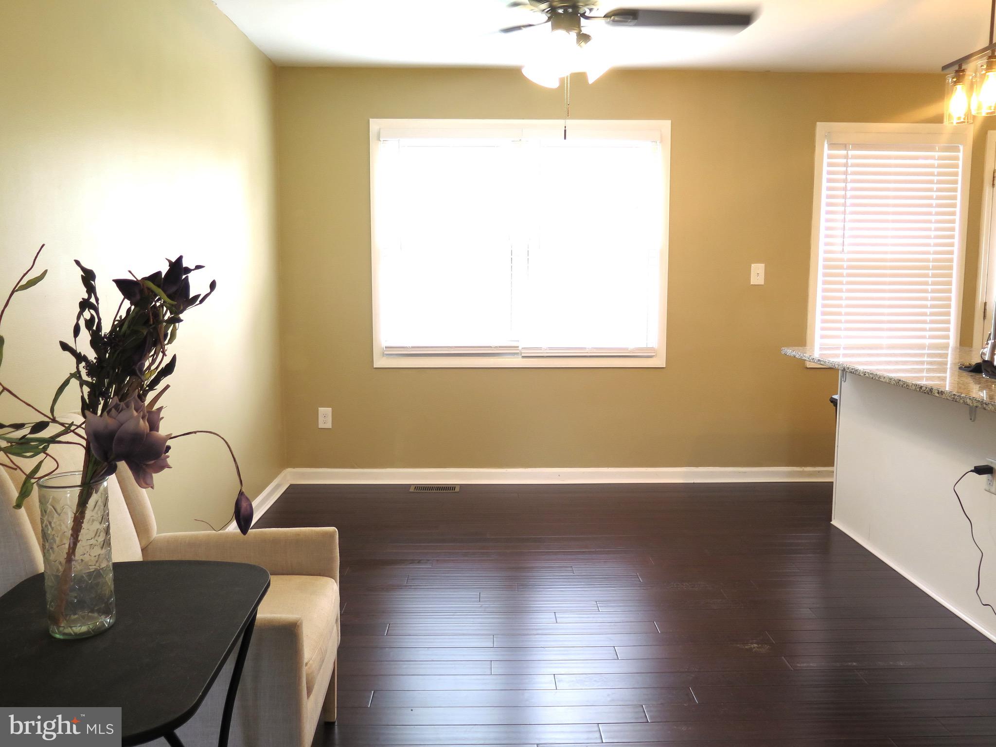 3939 Nemo Road Randallstown, MD 21133 - Photo 11 of 31 a view of a dining room with furniture and a chandelier