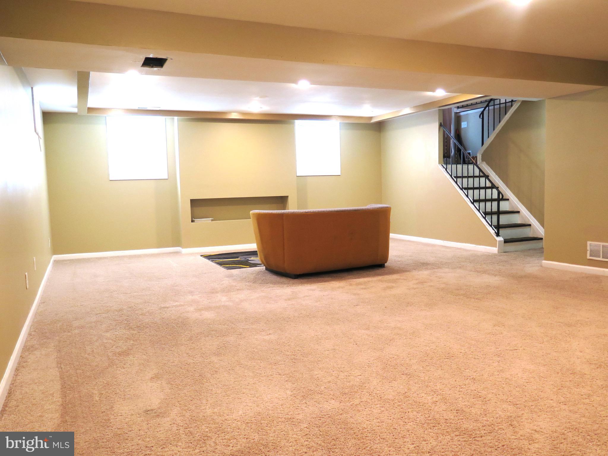 3939 Nemo Road Randallstown, MD 21133 - Photo 13 of 31 a room with furniture and a window