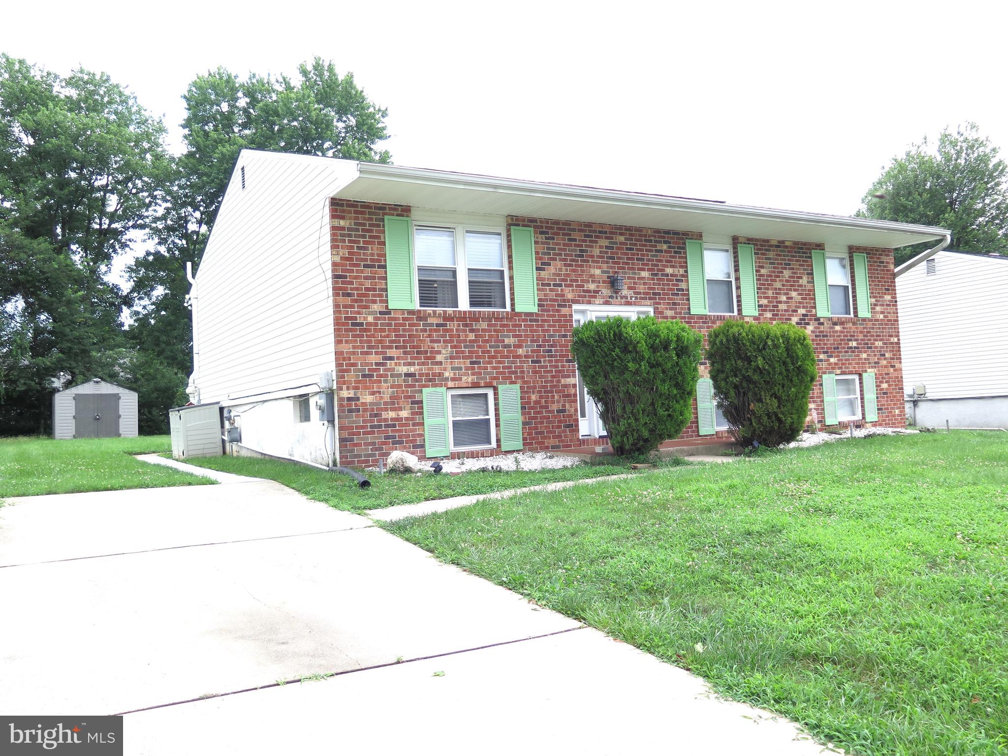 3939 Nemo Road Randallstown, MD 21133 - Photo 21 of 31 a front view of a house with a yard